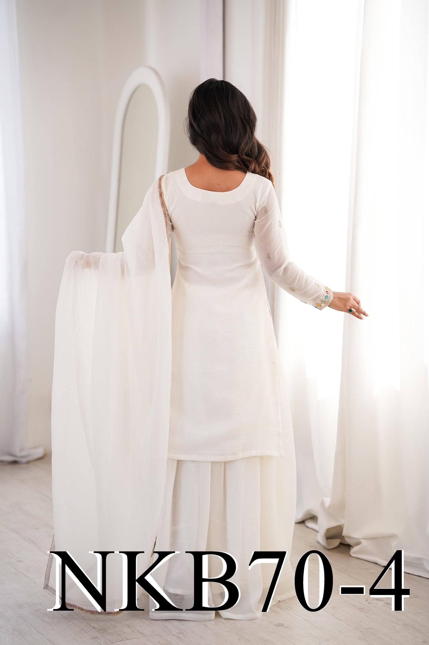 Nomi Sharara White