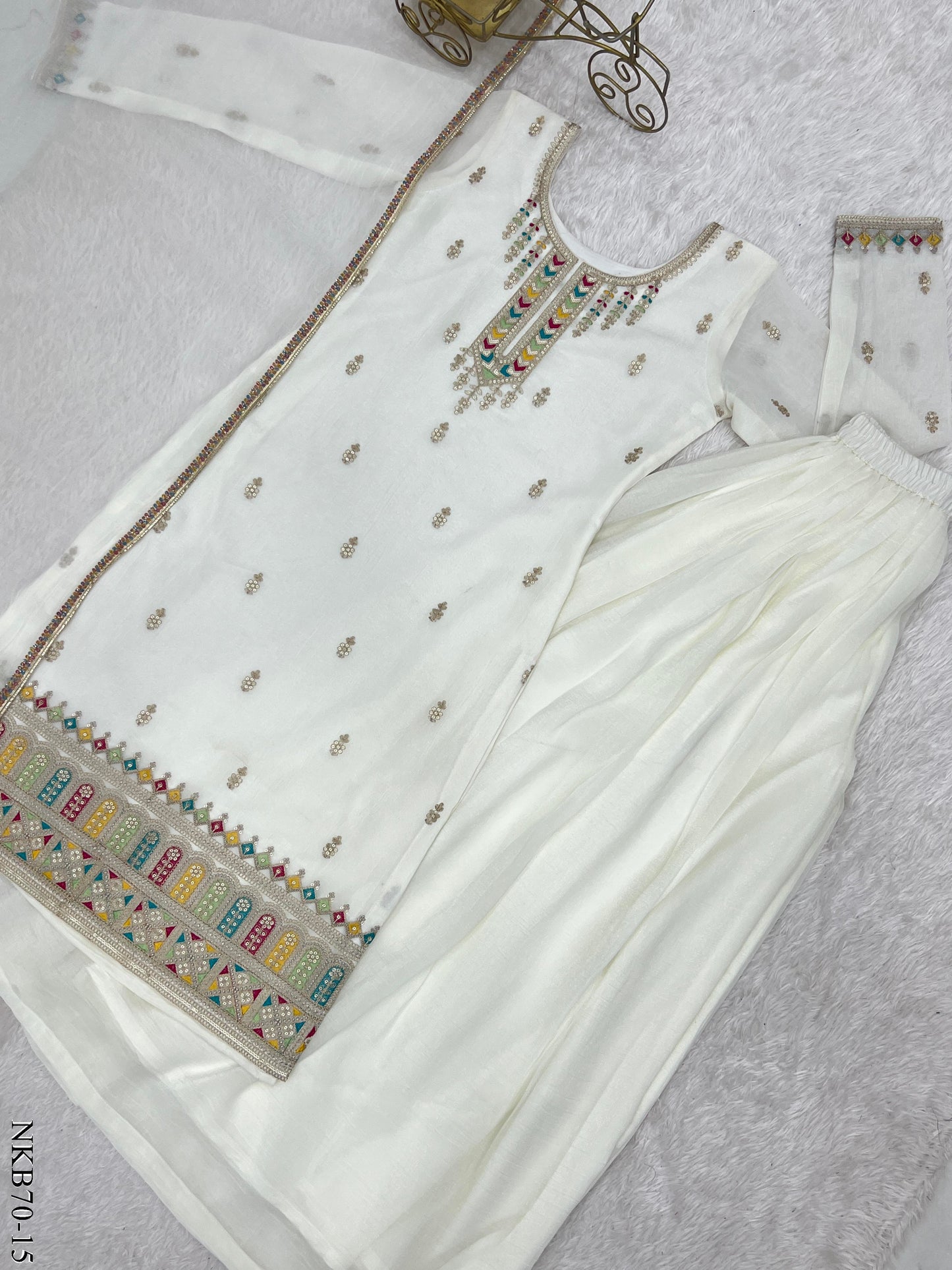 Nomi Sharara White